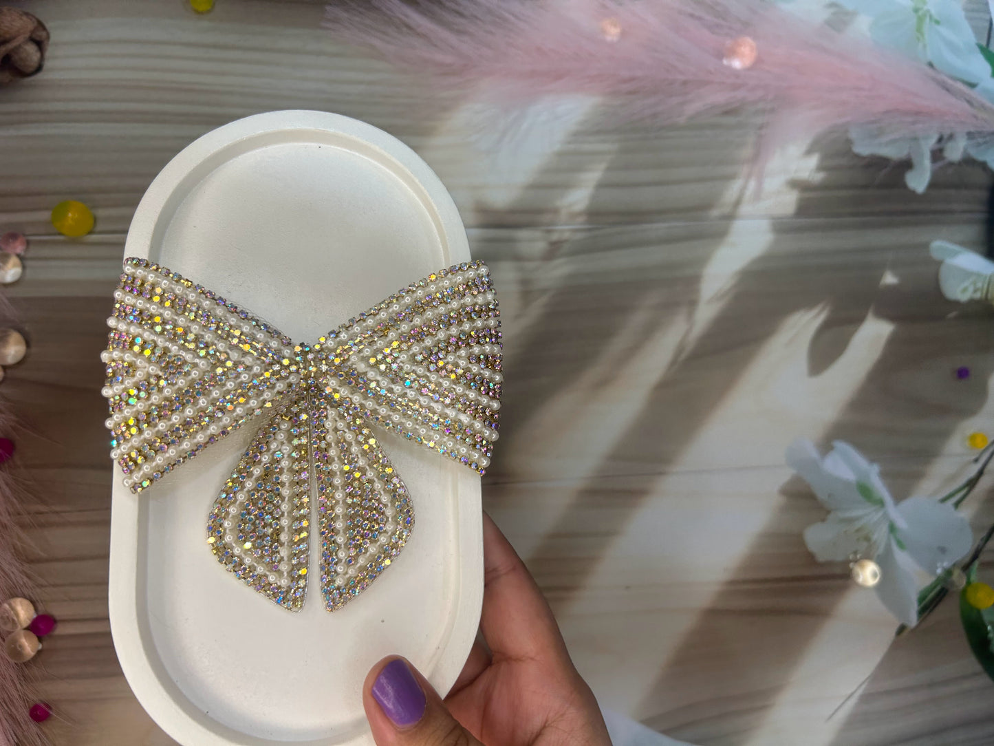 bow with stones and pearls